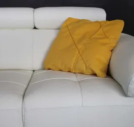 Cushion in yellow leather